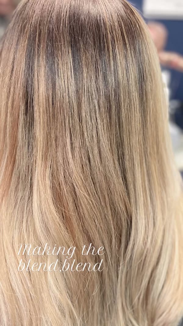 Long blonde balayage blended through the lengths.