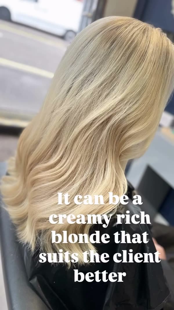 A warm creamy blonde rather than a white ash tone.